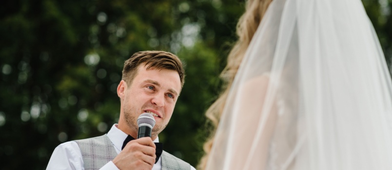 Bride and groom exchanging wedding vows