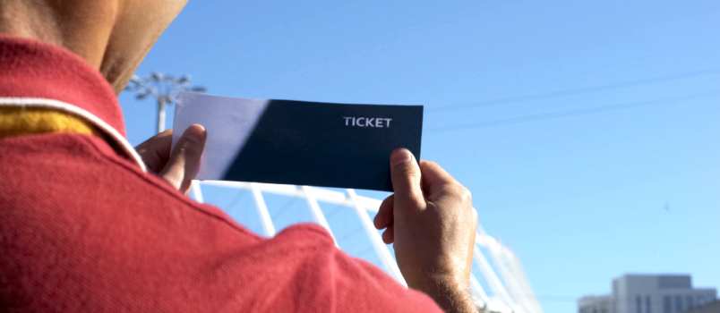 Man holding ticket