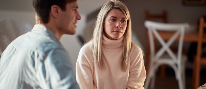 Sad young woman talking to each other