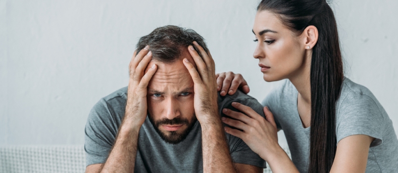 Woman comforting anxious partner