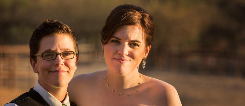 Man and woman dressed for wedding ceremony