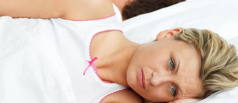 Sad Depressed Lady Lying Over On Bed And Looking Away Thinking Concept