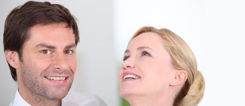 Man With Closed Eyes Holding Girlfriend's Head Love Concept