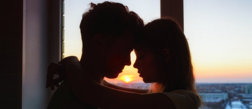 couple in love standing and looking at each other