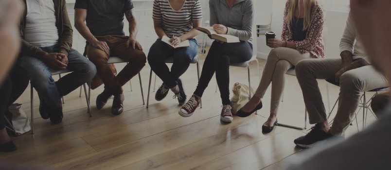 People sitting together in a support group