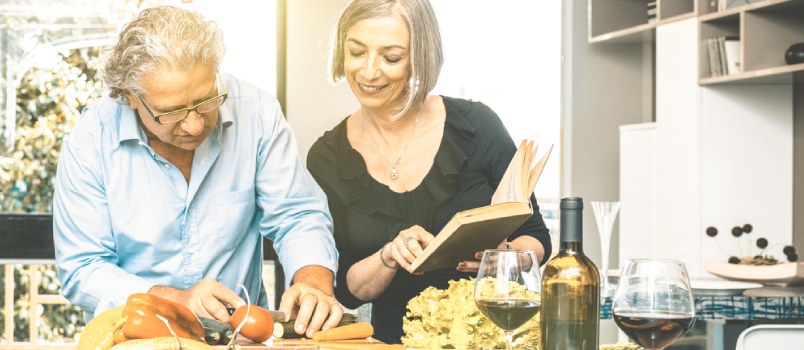 Couple creating dinner