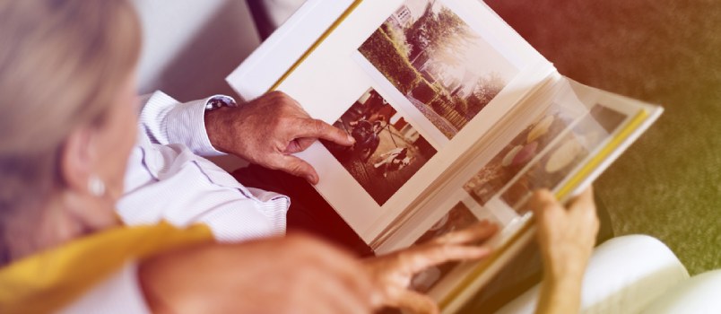 Couple watching their wedding album