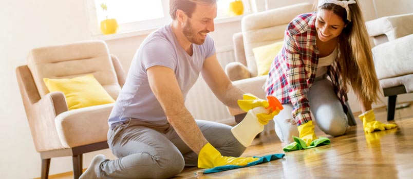 couple cleaning and doing chores together