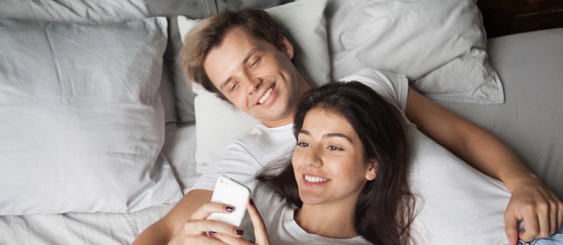 couple smiling and doing things together