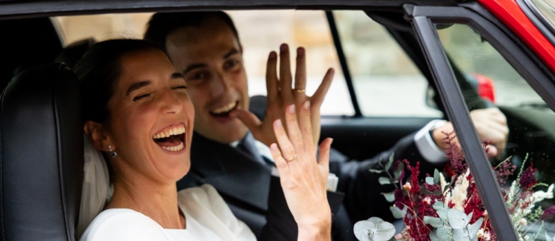 couple showing engagement ring