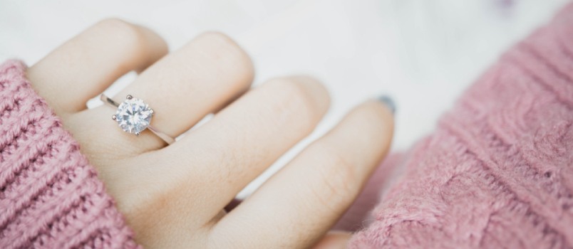 Some women are concerned about the lack of size of the diamond in their engagement ring Some women are concerned about the lack of size of the diamond in their engagement ring