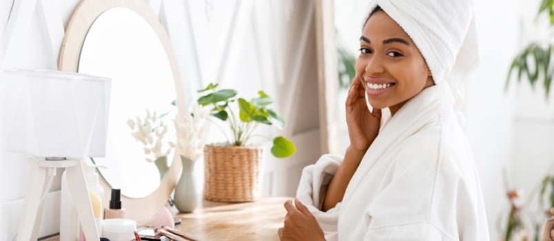 black woman at spa taking care of herself