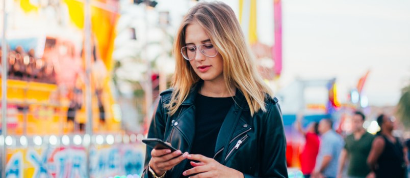 beautiful woman looking at phone
