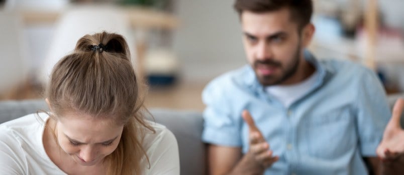 White man and woman having a heated argument