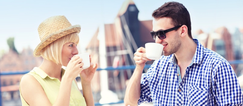 Tourist relaxing having coffee