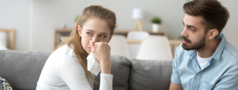 woman crying man consoling