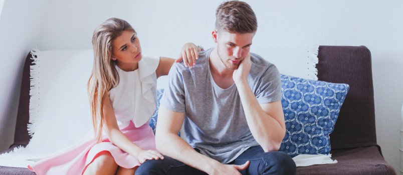 woman comforting sad man