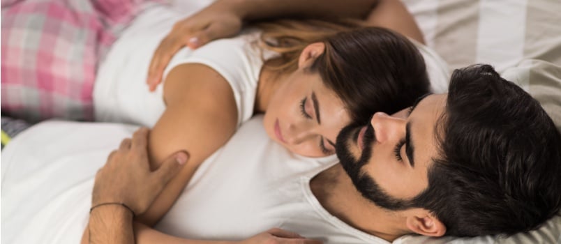 Young couple sleeping together