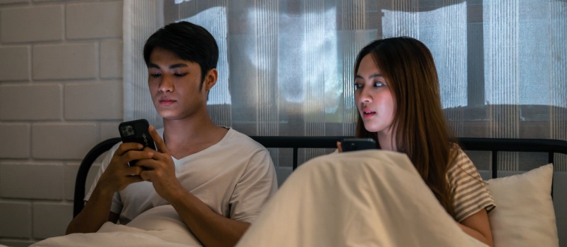 Couple using smartphone