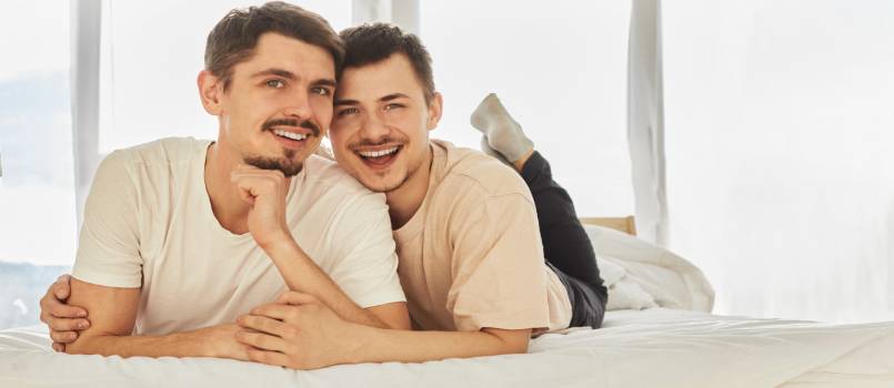 Gay couple resting on table