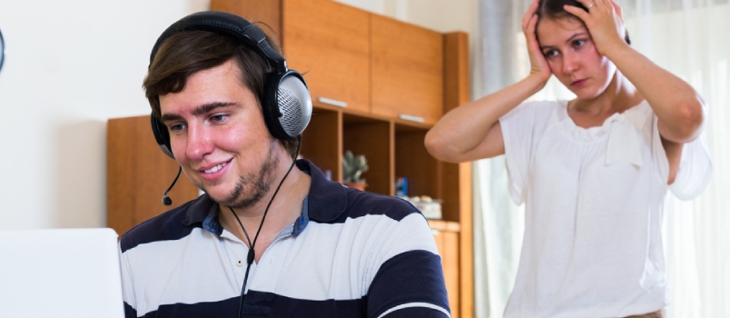 angry spouse and happy person with internet addiction at home