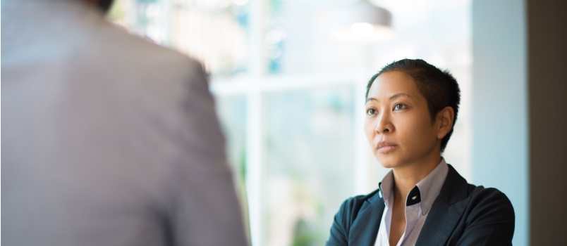 Businessman looking at male partner