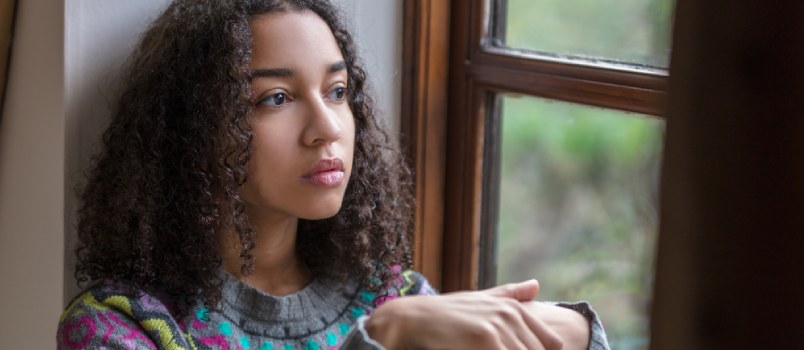 Young Depressed Lady Sitting Alone On Winow