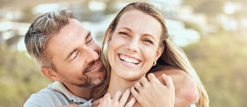 Loving Couple Embrace Each Other Outdoors Joyfully