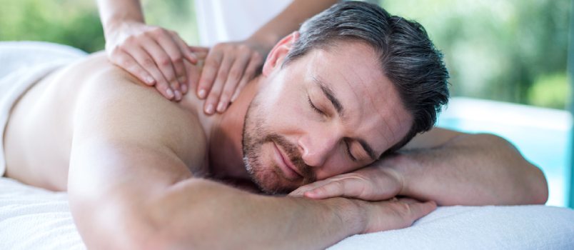 a man enjoying a massage