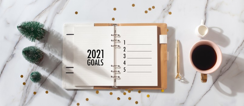 a planner with coffee