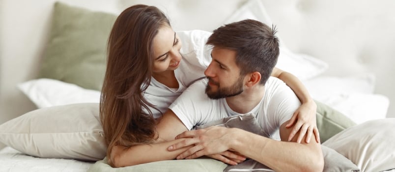 cute couple in a bedroom