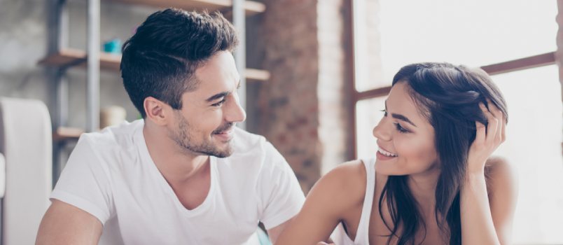 couple looking at each other happily