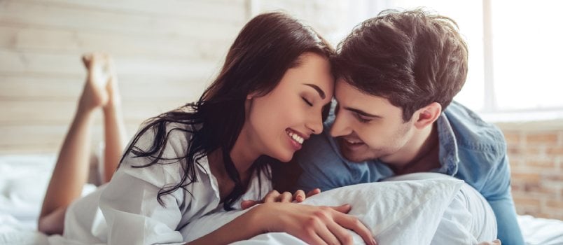 girl and boy snuggling in love