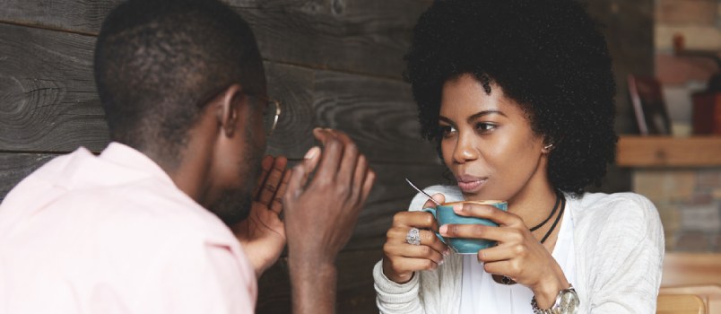 African Black Man And Women Dating Together And Women Having Icecream In A Cup