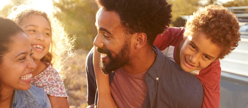 Back each other up Parents Giving Their Kids Piggybacks Waist Up