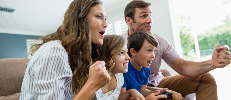 Be flexible in your parenting Excited Family Playing Video Games Together