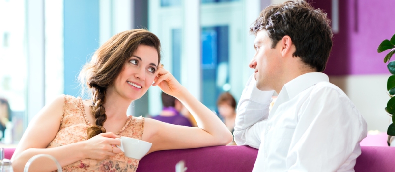 Communication Beautiful Couple Talking And Smiling At The Outdoor Coffee Bar