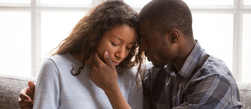 Don’t make your partner feel low Loving African American Husband Touching Wife Face With Tender
