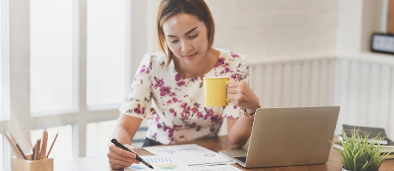 Find a suitable job Wonderful Women Working Frrom Home With Cup of Coffee