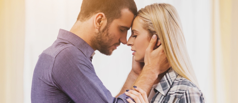 Man With Closed Eyes Holding Girlfriend's Head Love Concept