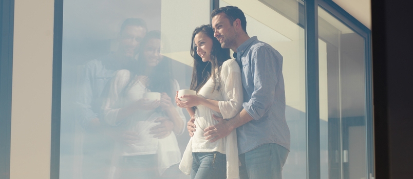 Romantic Happy Young Couple Relax At Modern Home Indoors