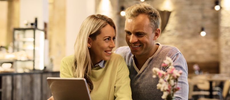 Happy Couple Smiling Together At Home