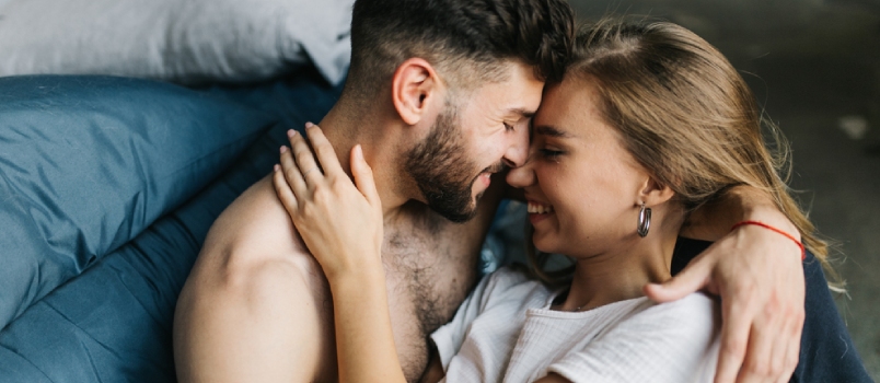 Beautiful Loving Couple Having Romance In Bedroom