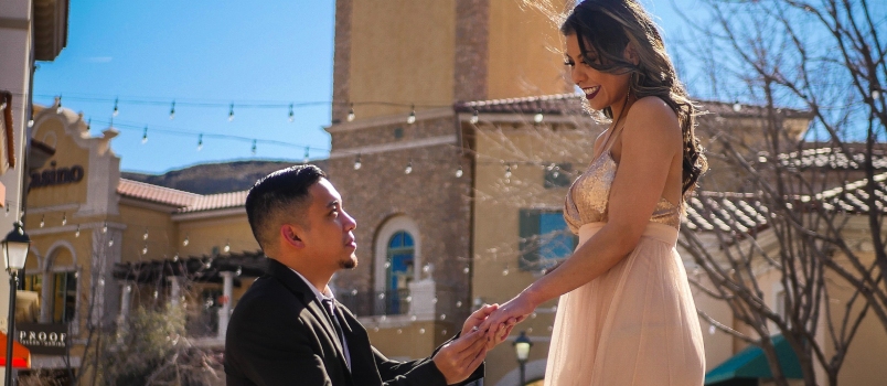 Man On Knees In Front Of Woman Ask For Marriage