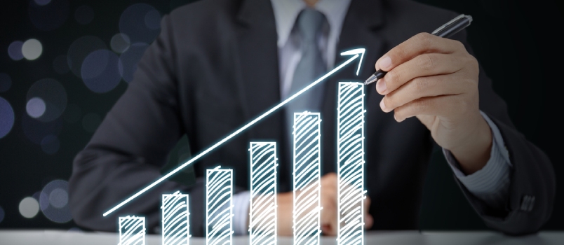 Businessman Present Graph With Growth