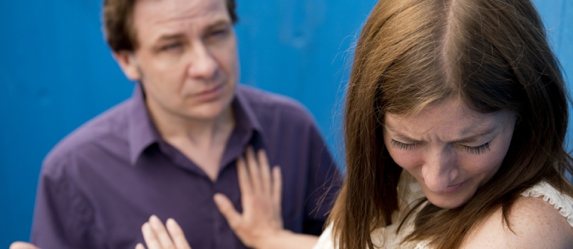 Abusive Couple With Blue Background