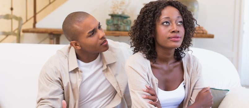 Unhappy Woman Not Listening To His Excuses At Home In The Living Room