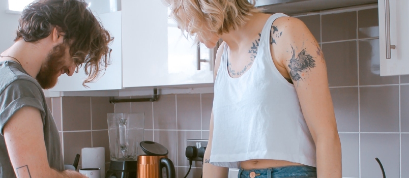 Woman And Man In Kitchen