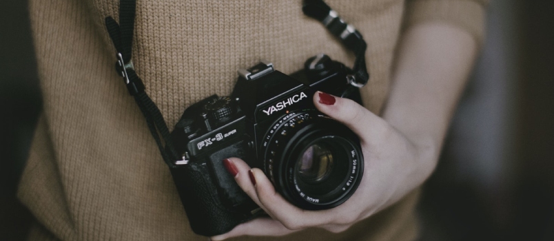 Person Holding Black Yashica Fx-9 Camera