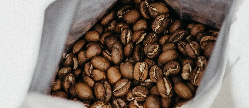 Brown Coffee Beans In The White Paper Bag